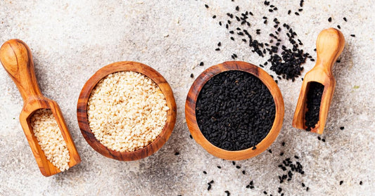 Black and white sesame seeds in bowls