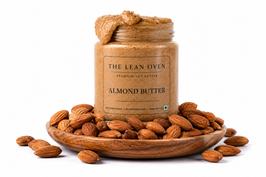 Jar of single-ingredient almond butter with whole almonds