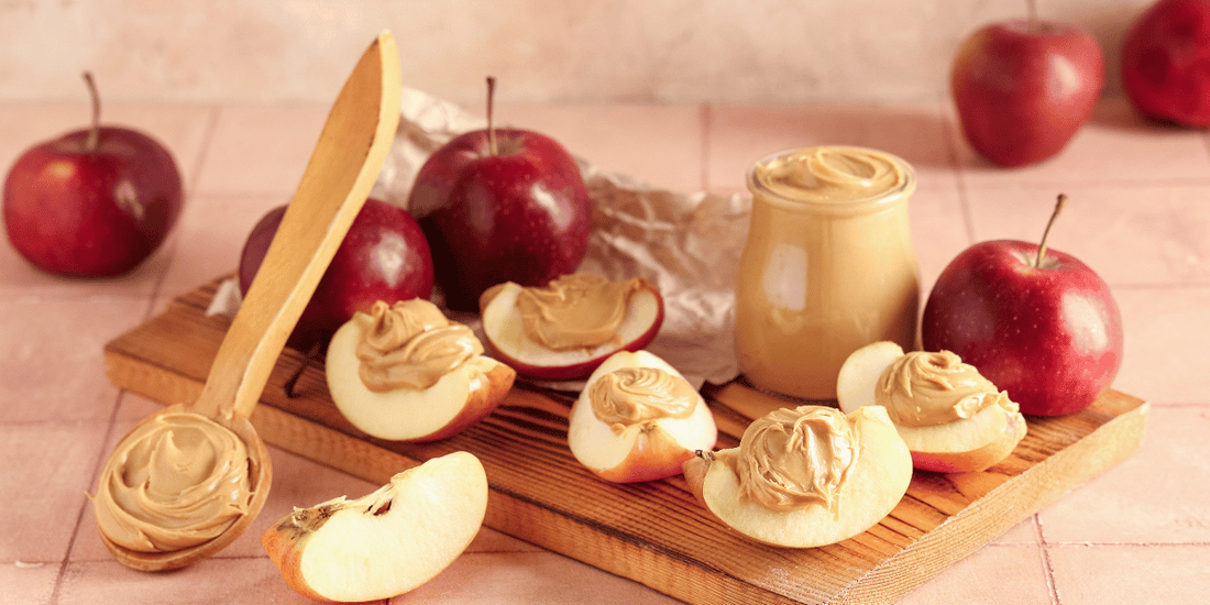 Apple slices with natural peanut butter and fresh apples for a healthy weight loss snack