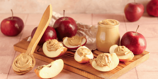 Apple slices with natural peanut butter and fresh apples for a healthy weight loss snack